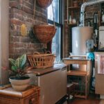 Kitchen with Hanging Baskets, Deep Freezer, and Water Heater